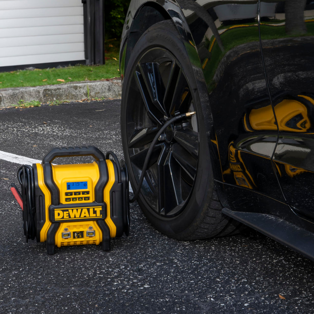 DEWALT DXAEPS14 LED work light in use illuminating a dark repair area for better visibility
