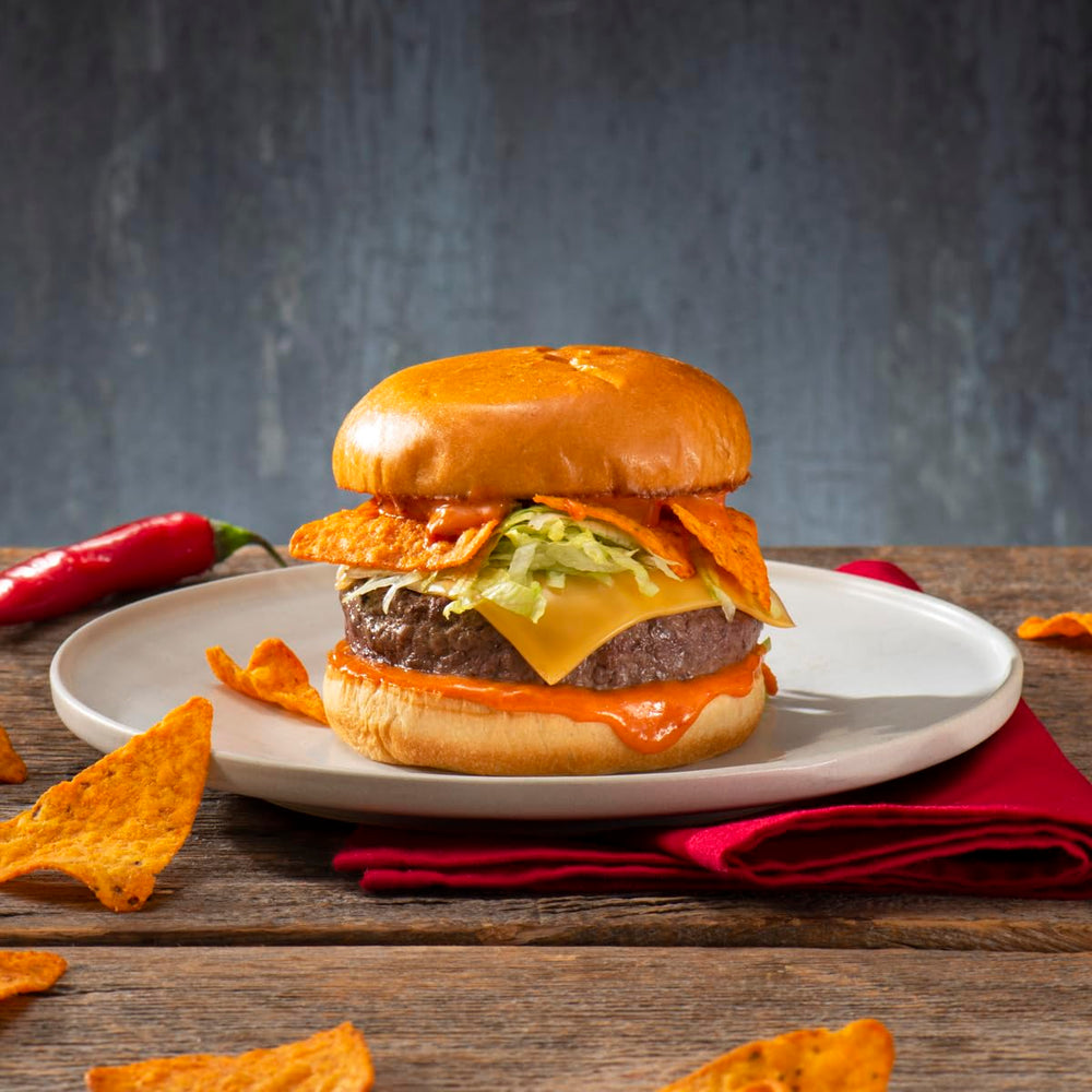 Doritos chip dipped into salsa showing pairing and flavor enhancement