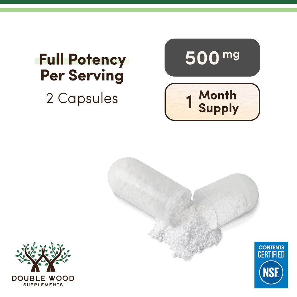 Double Wood Supplements capsules spread on surface emphasizing easy daily dosing