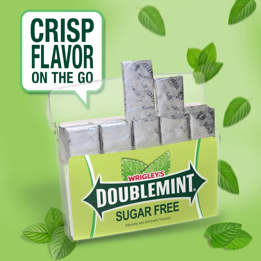 Hand holding Doublemint pack showing compact size and portability
