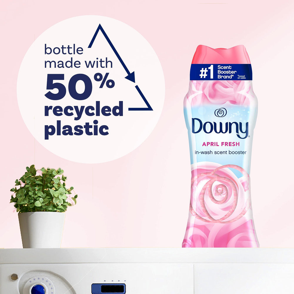 Downy April Fresh jar next to common household items showing 30.1 oz scale