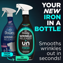 Downy travel size spray in hand for quick on-the-go freshening benefit
