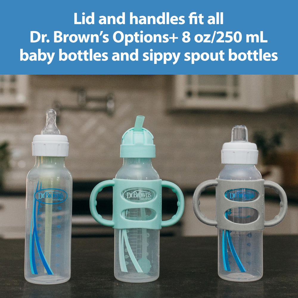 Dr. Brown's bottle and cup in use with baby showing comfortable feeding