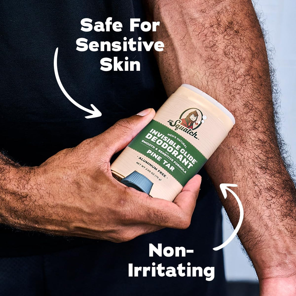Dr. Squatch stick in a hand to show 2.65oz size for easy scale and travel convenience
