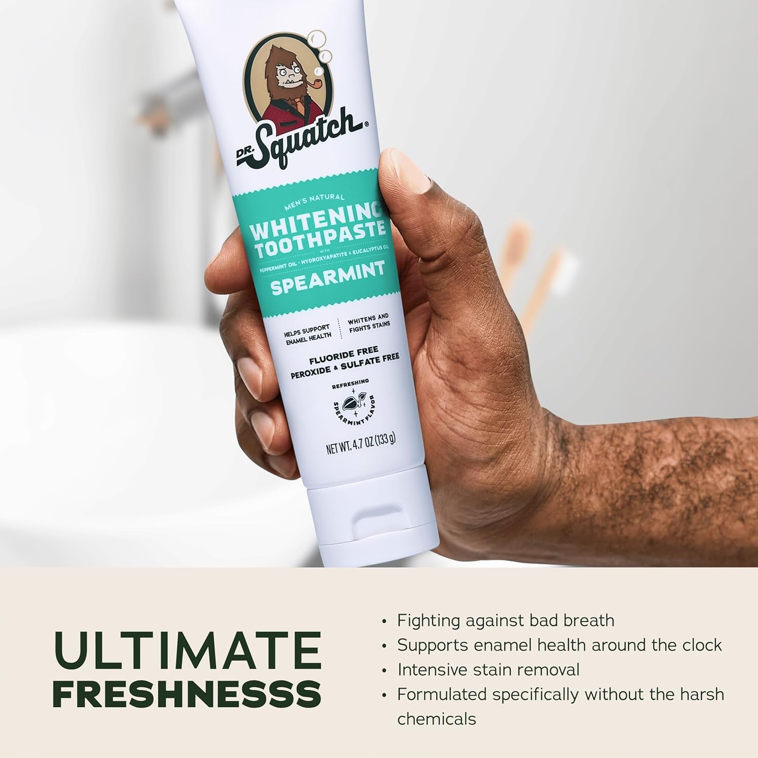 Dr. Squatch Spearmint paste on toothbrush demonstrating easy application and freshness