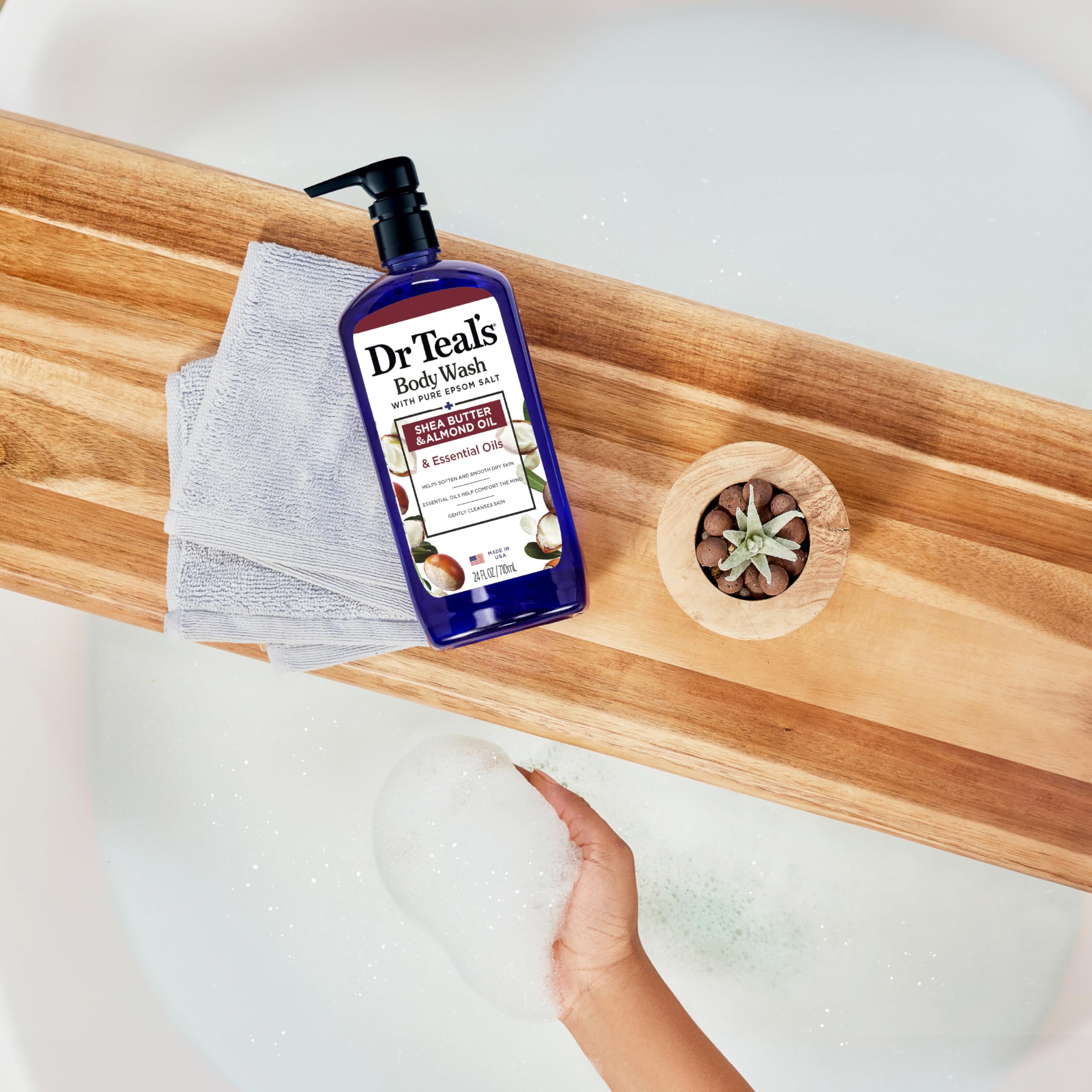 Dr Teal's bottle near shea butter showing moisturizing ingredient benefit
