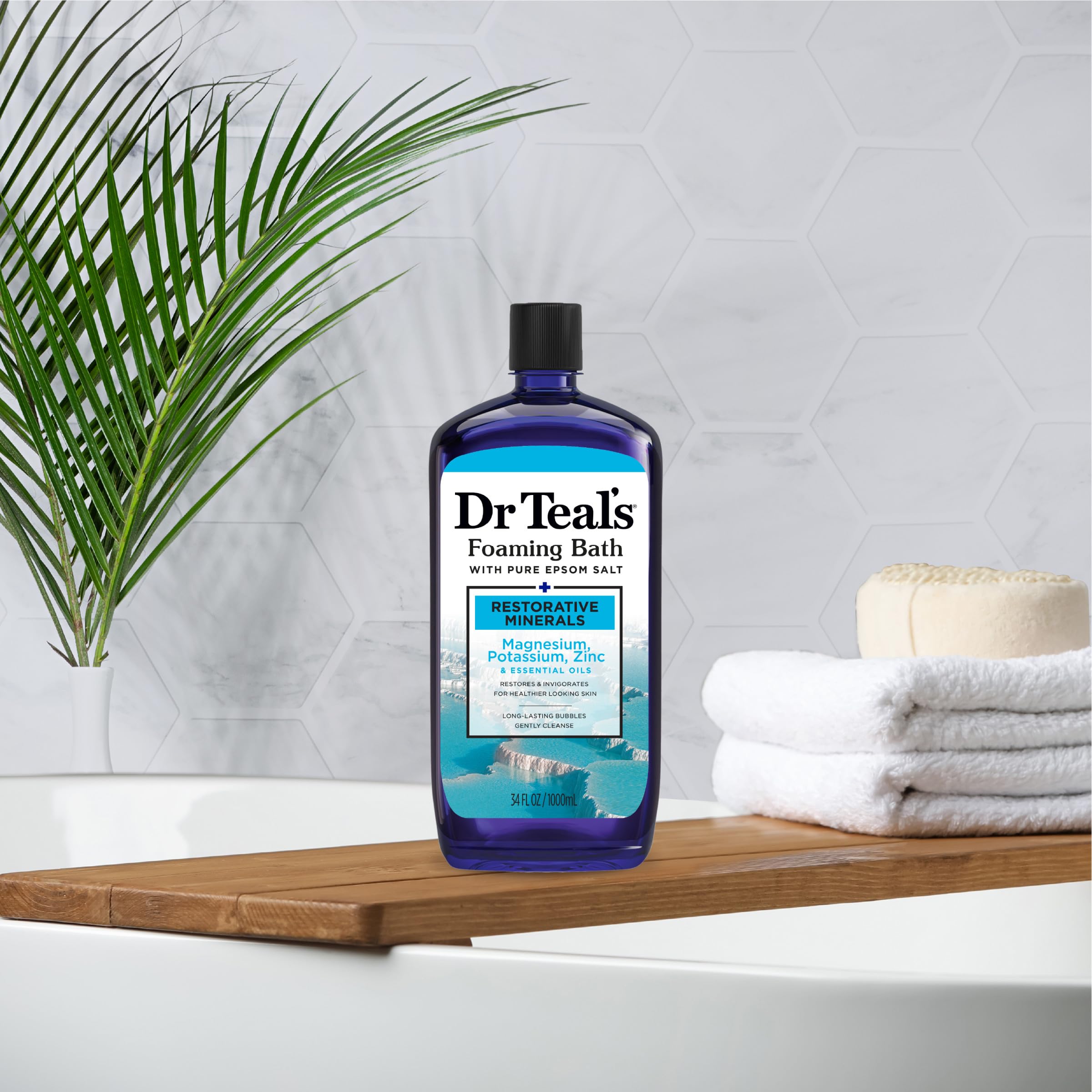 Dr Teal's product poured into hand demonstrating creamy foam benefit