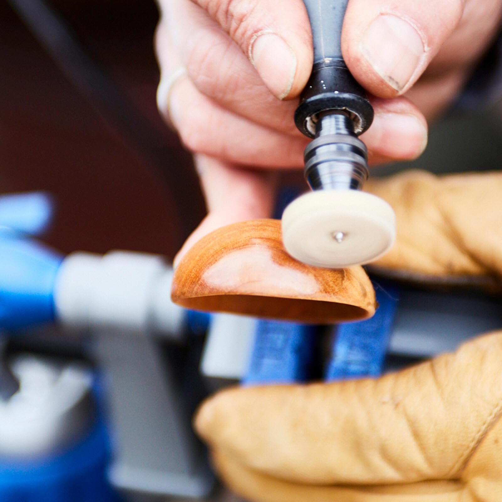 Dremel rotary tool in use cutting metal demonstrating clean, controlled cuts