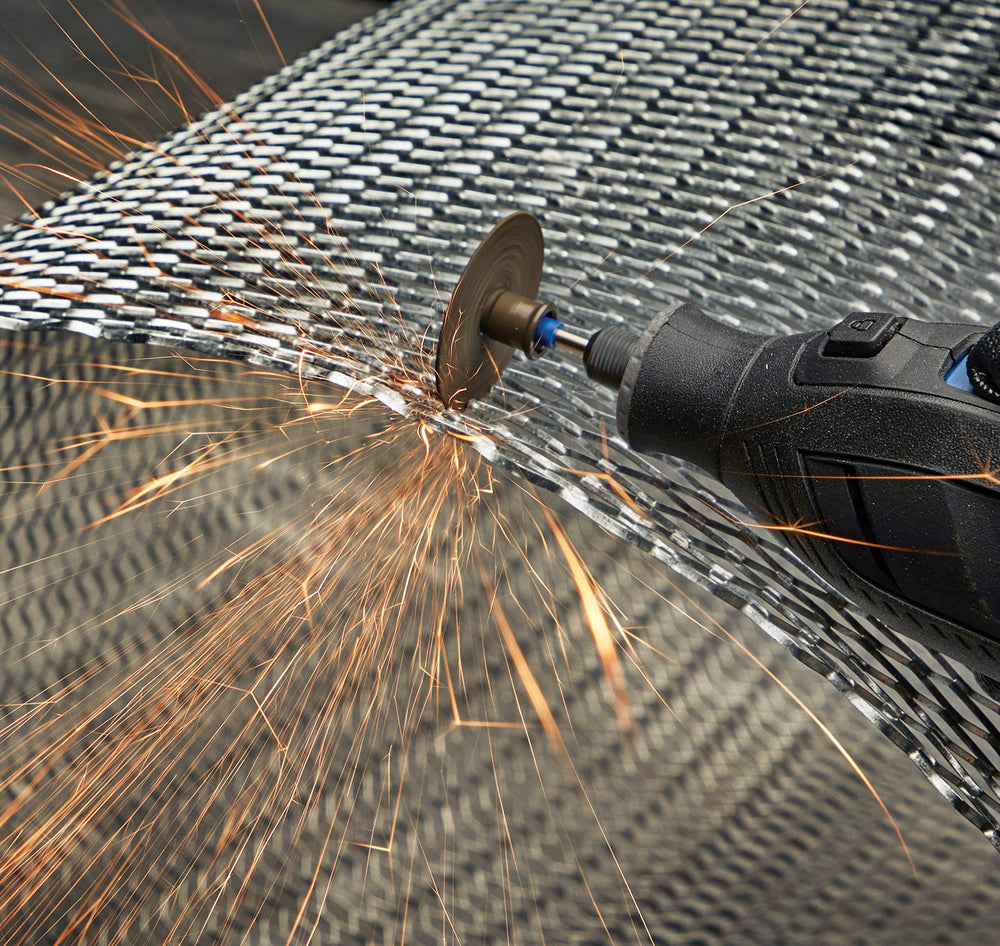 Dremel wheel next to ruler showing 1.5 inch diameter for tight-space cutting