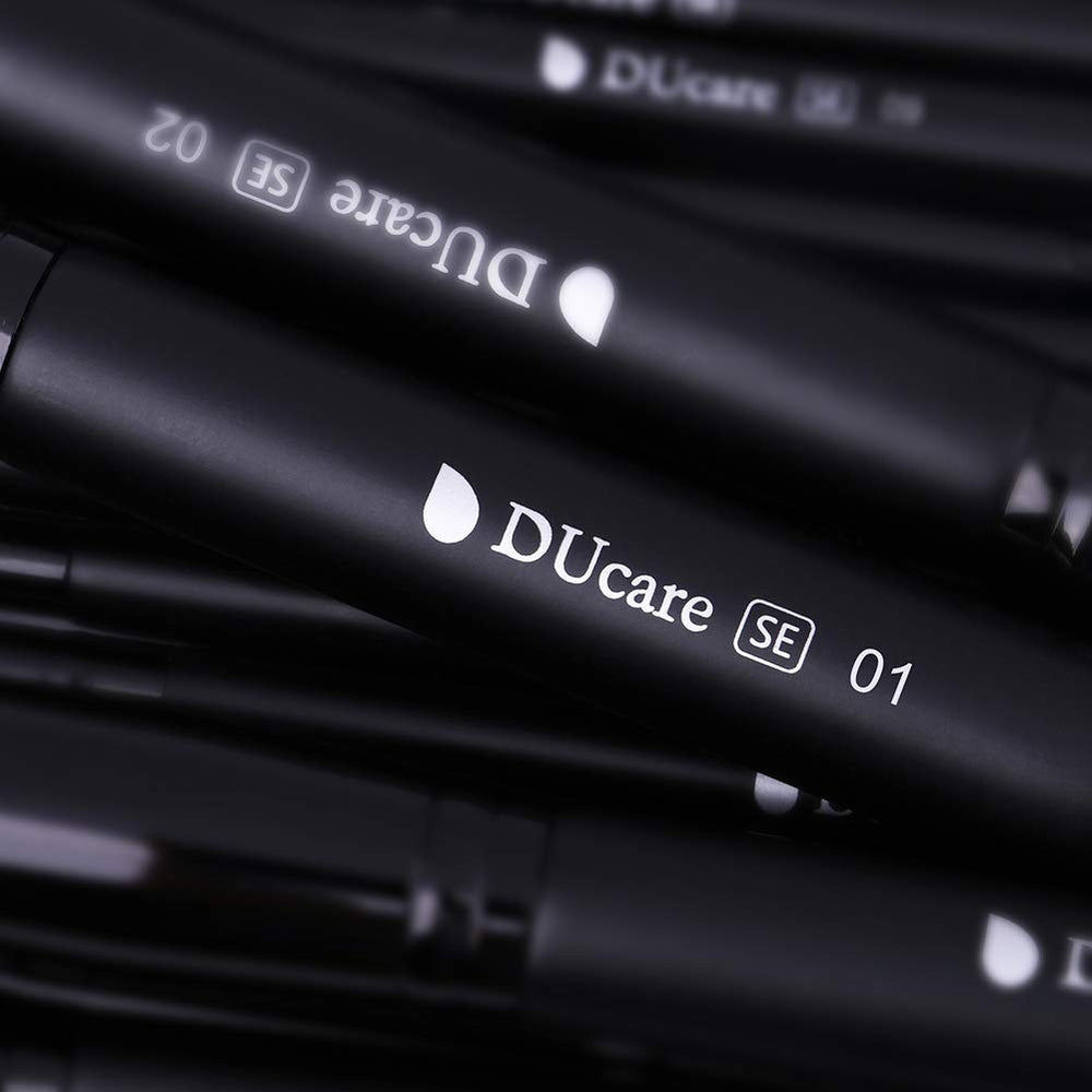 DUcare size comparison hand holding brush to show scale and easy handling