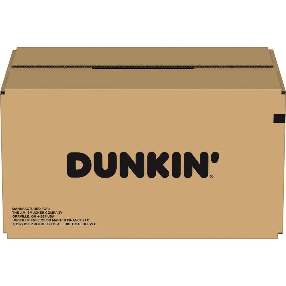 Dunkin' pods displayed in an office breakroom indicating convenient catering supply