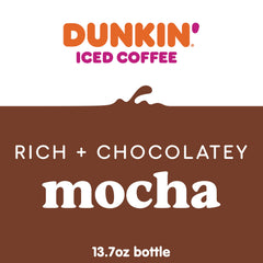 Dunkin' mocha being poured to show rich chocolate color and creamy texture