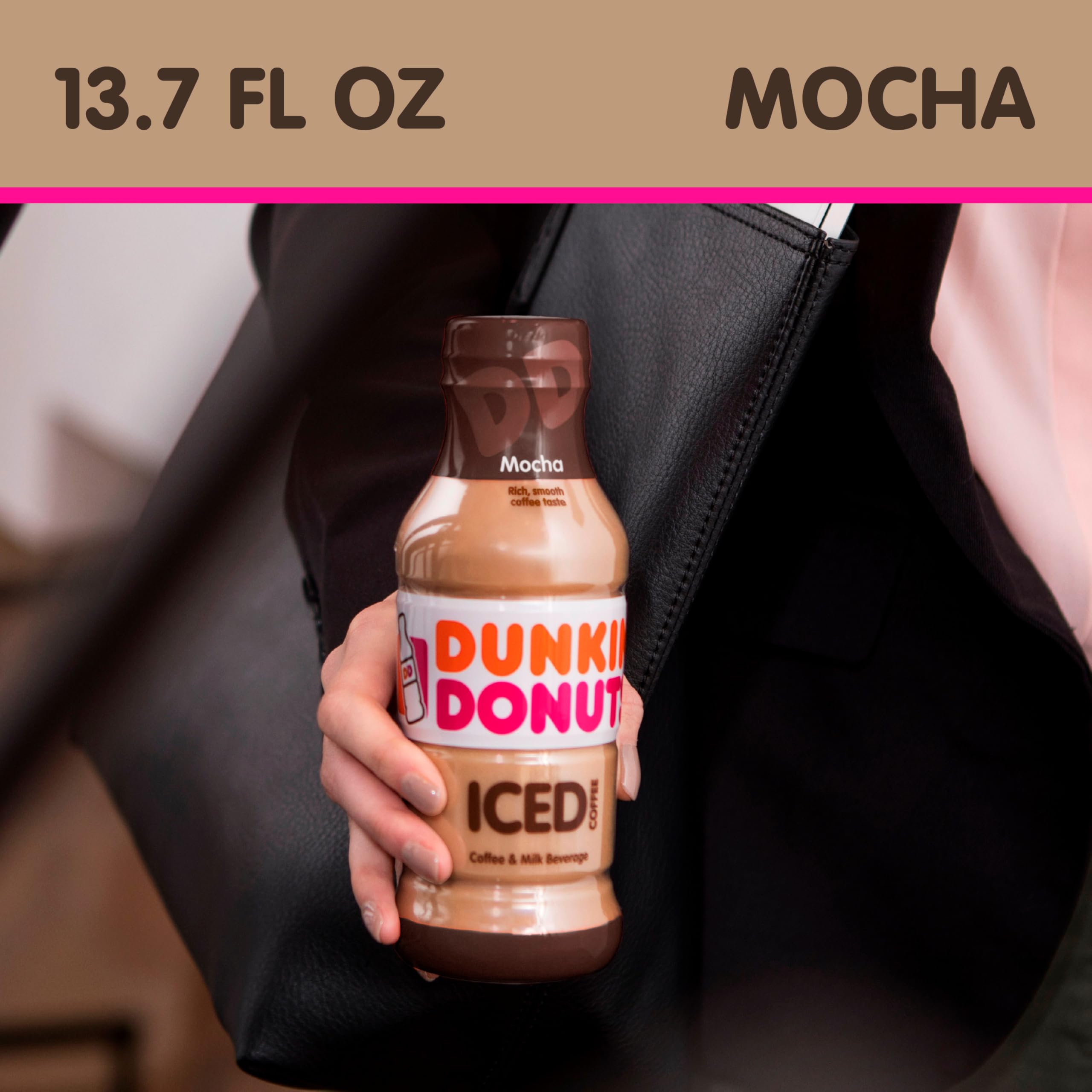Dunkin' bottle held in hand to show 13.7 fl oz scale and portability
