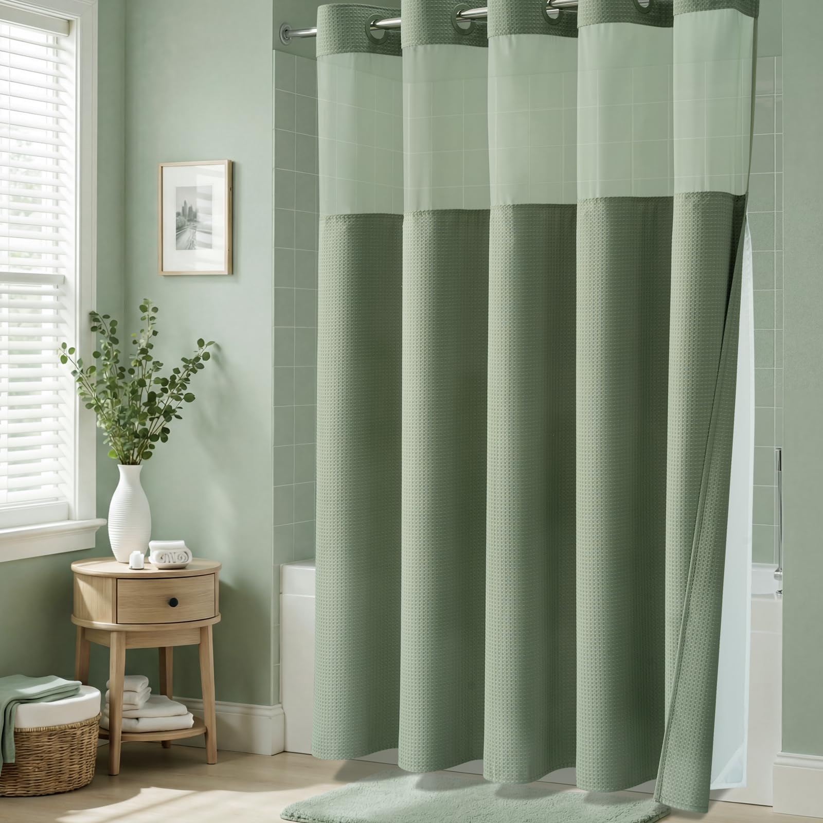 Dynamene styled bathroom scene with sage curtain adding calm color and cohesive decor