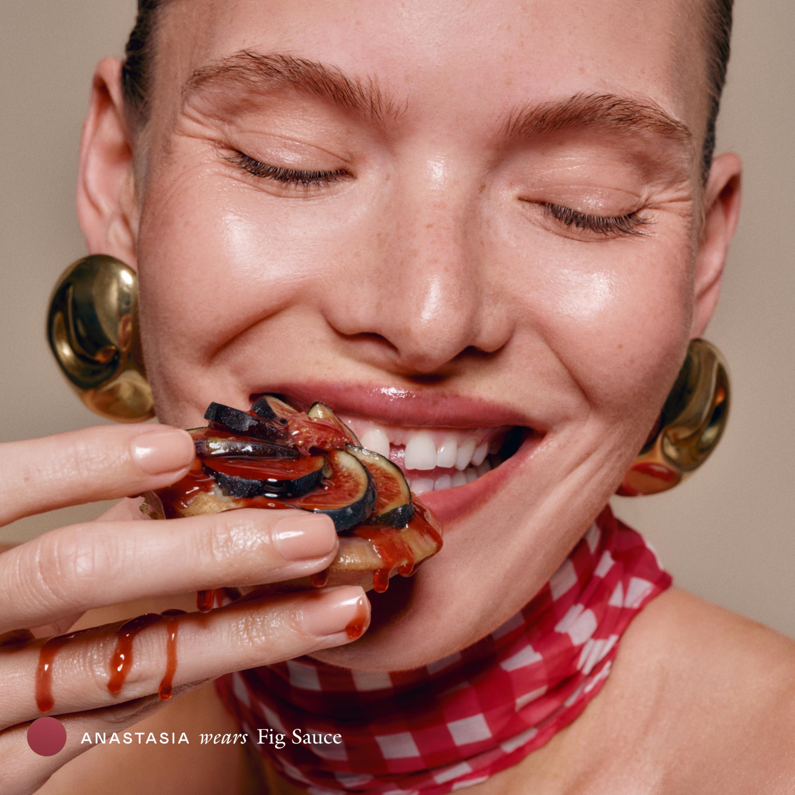 EADEM application on lips showing gloss coverage benefit: smoother hydrated appearance