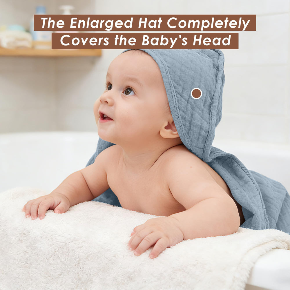 Ease Cubs towel on measuring mat showing 32x32 inches for full infant coverage