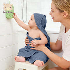 Ease Cubs towel in use wrapping a baby to provide cozy warmth after bath