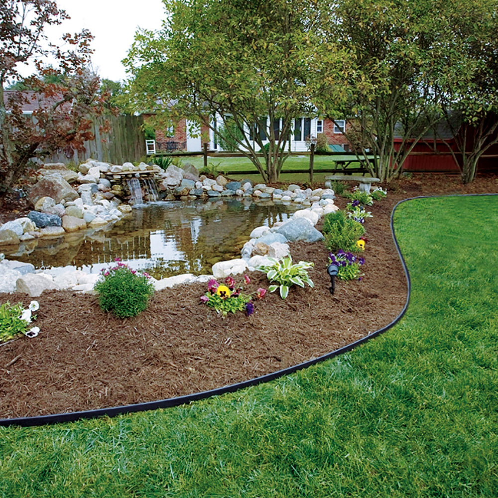 EasyFlex edging framing a garden bed in a yard setting showing tidy borders and low maintenance