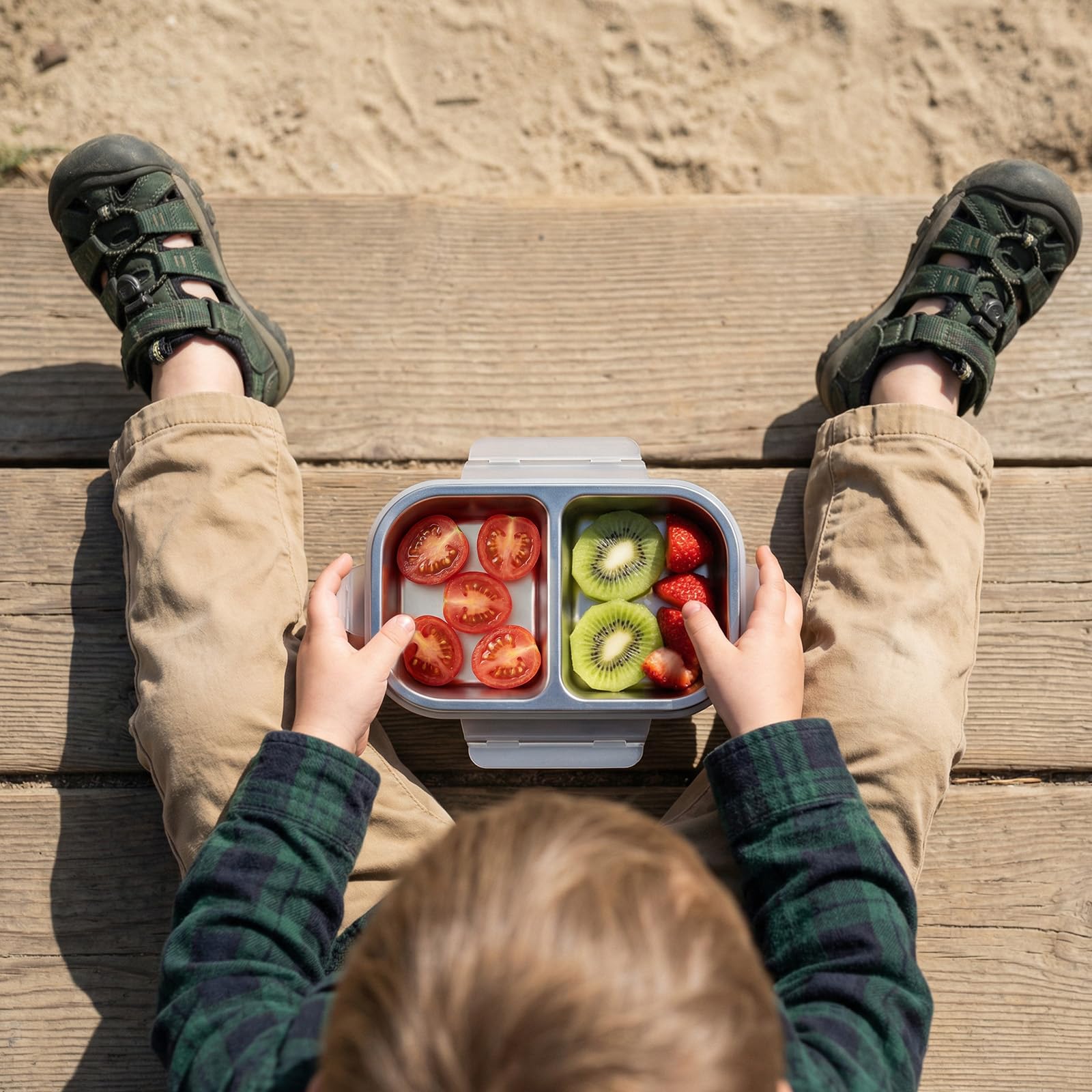 EC-Gaze held in an adult hand for scale, compact dimensions for grab-and-go convenience