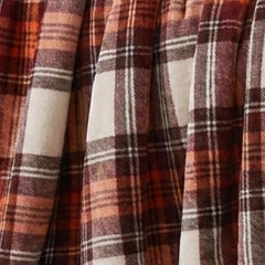 Eddie Bauer throw next to ruler showing 50x60 size for scale and fit