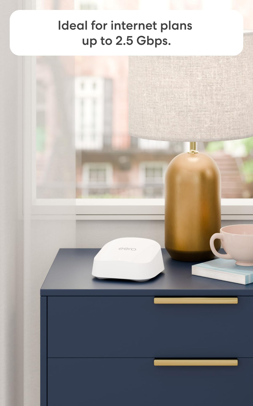 eero 7 next to smartphone for scale showing compact size and easy placement