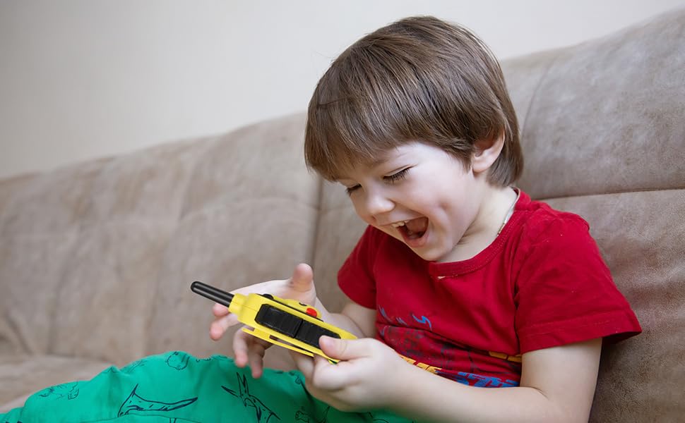 eKids Pikachu walkie talkie held in hand to show size and portability benefit