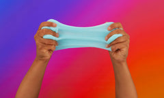 Elmer's clear and color-changing glue bottle close-up, shows labels and pour tip