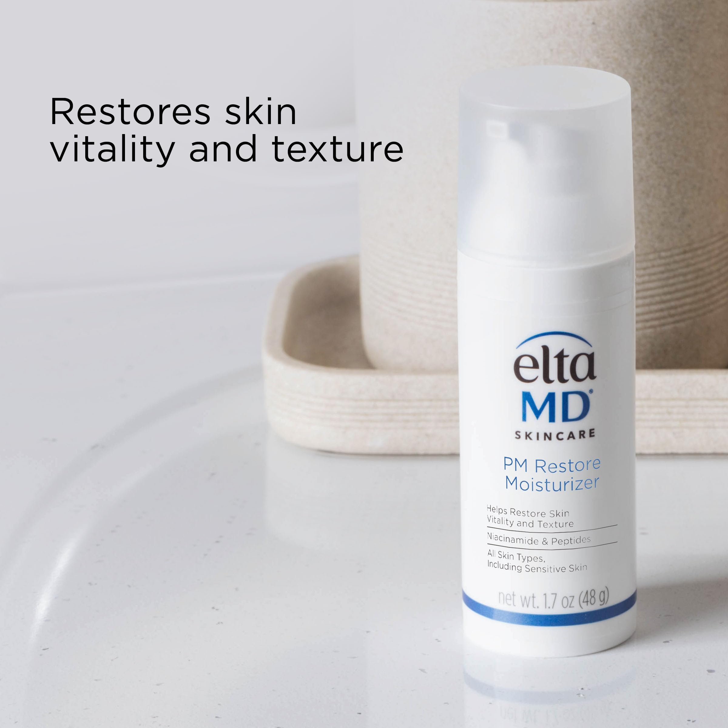 EltaMD 1.7 oz beside a cosmetic tube for scale, small travel-friendly size