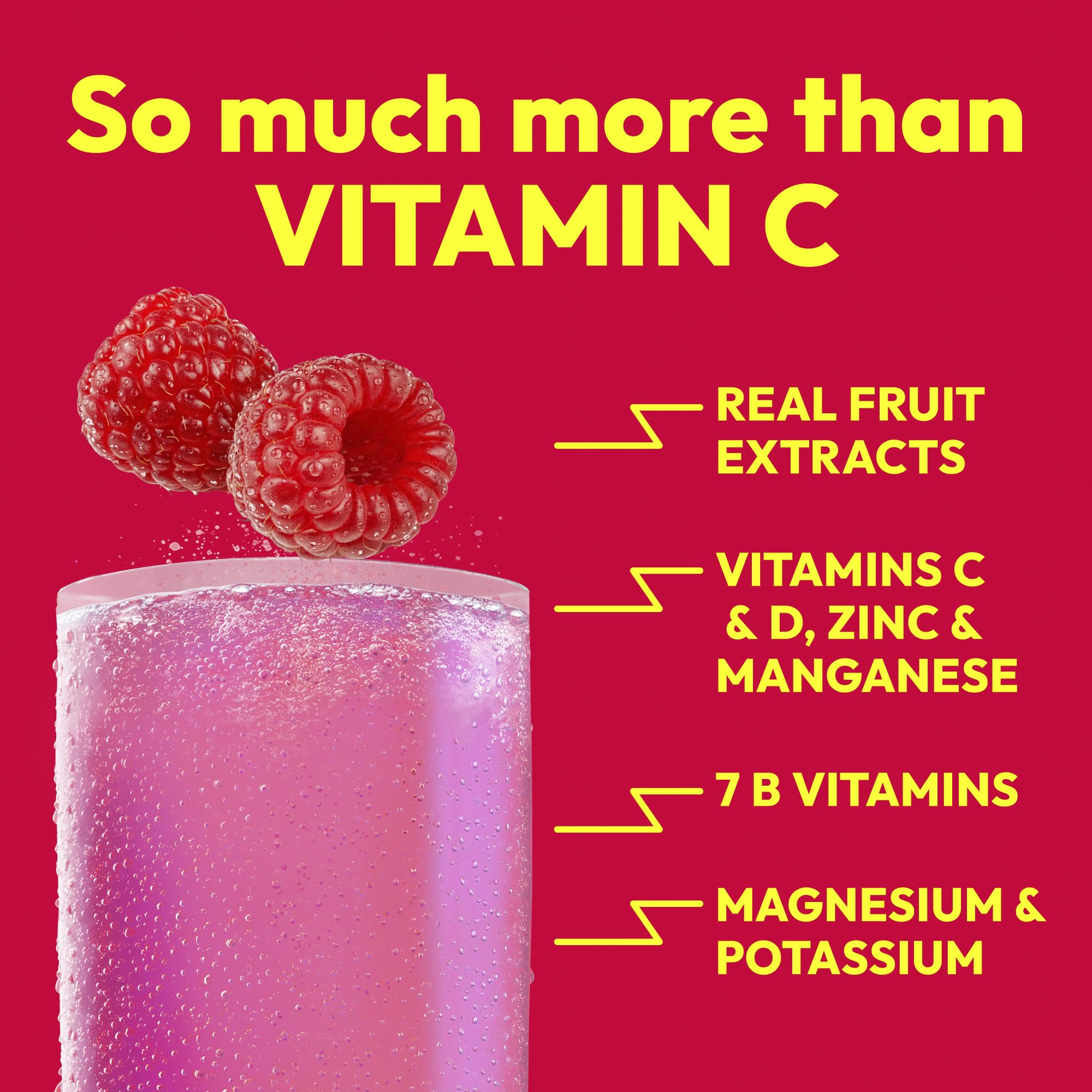 Close-up of Emergen-C Raspberry powder texture demonstrating easy dissolving mix