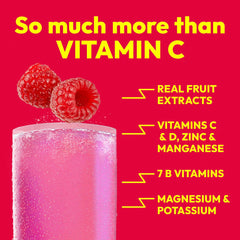 Close-up of Emergen-C Raspberry powder texture demonstrating easy dissolving mix
