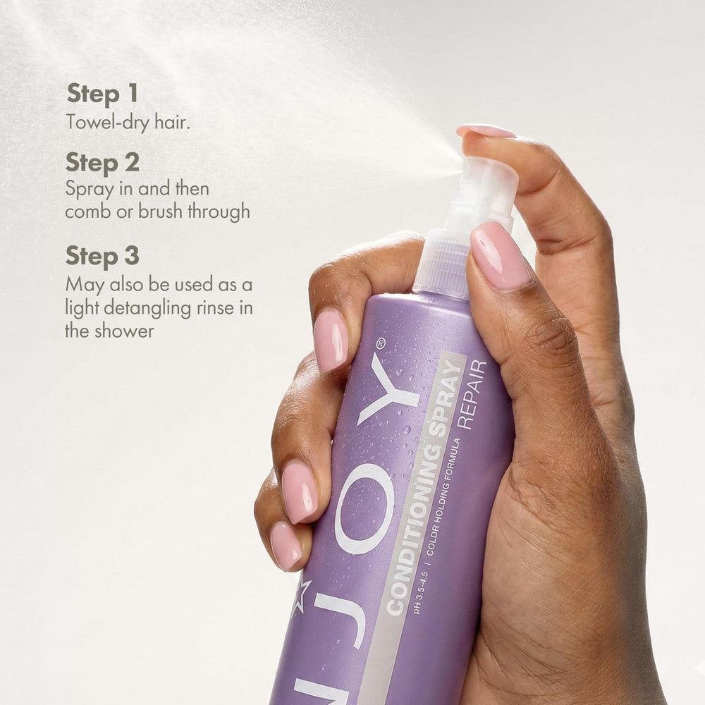 Enjoy conditioning spray next to ruler for size and 10.1 fl oz scale