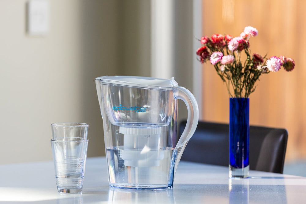 Epic Water Filters pitcher on kitchen counter with fresh glasses showing everyday drinking and cooking benefit