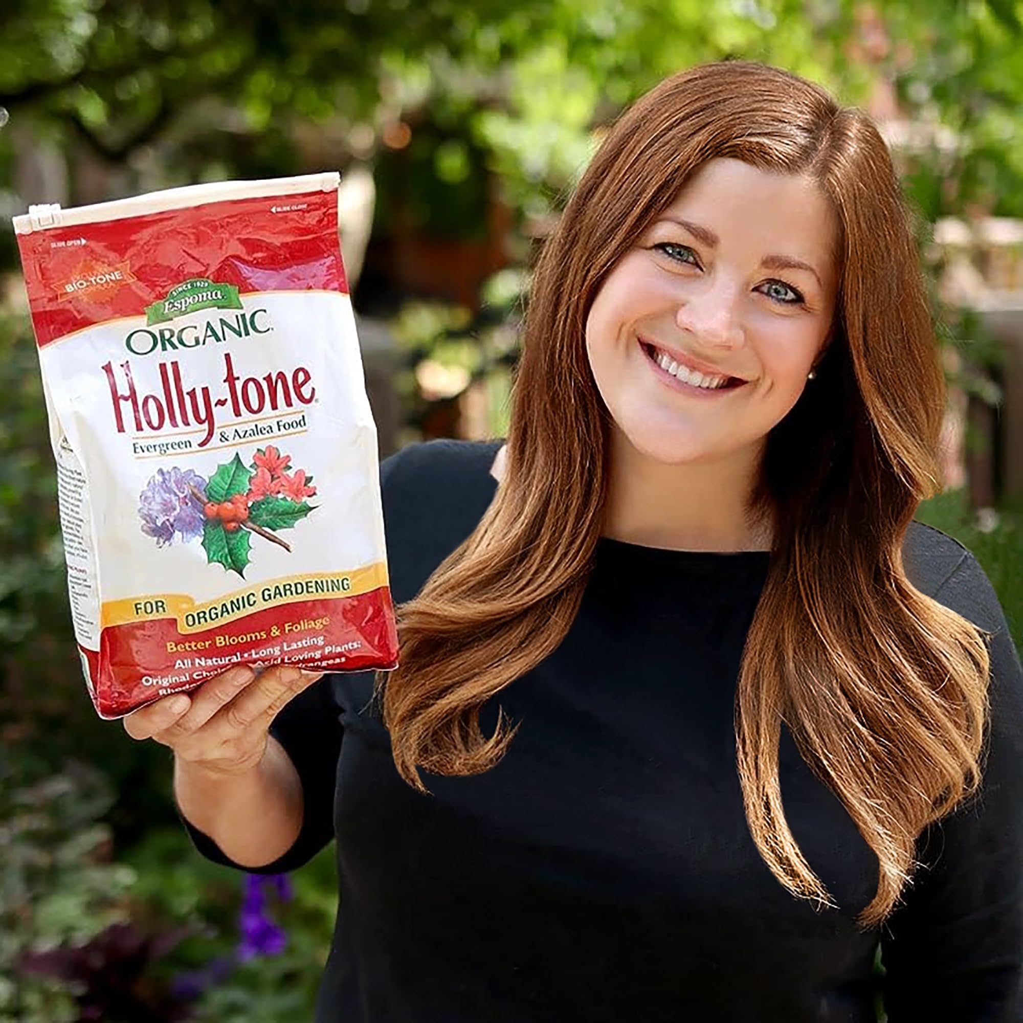Espoma Holly-Tone bag held in hand showing package scale and convenience