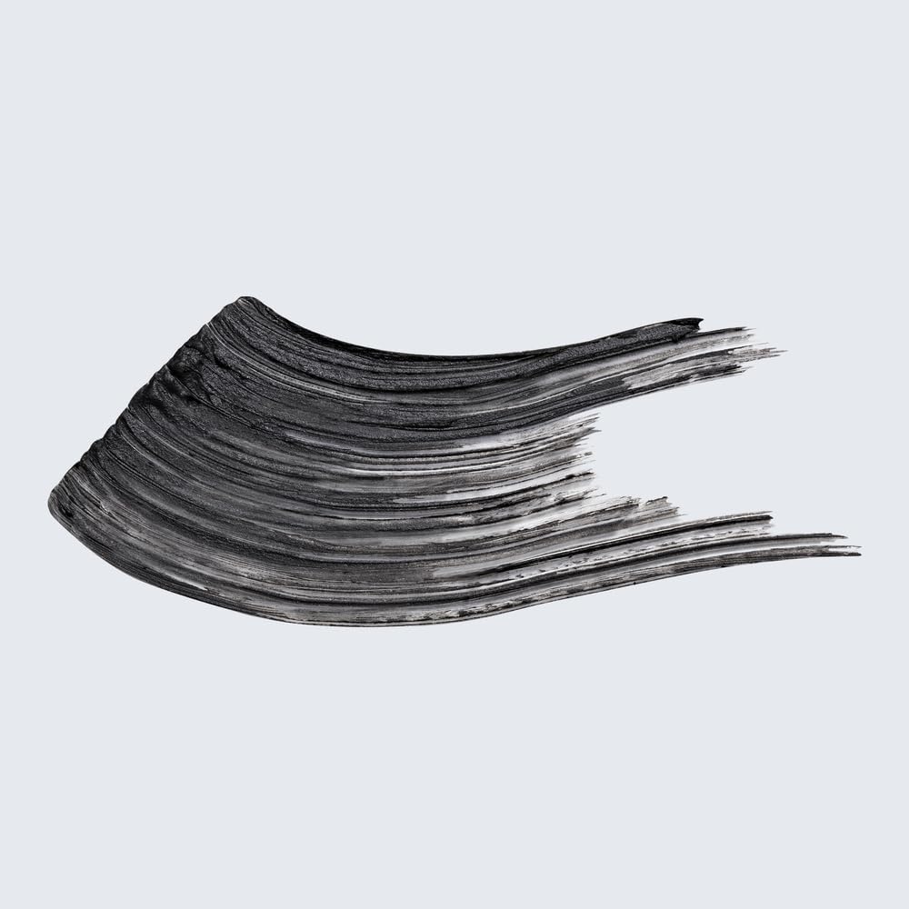 Estée Lauder brush close-up showing micro-fiber bristles for precise lengthening