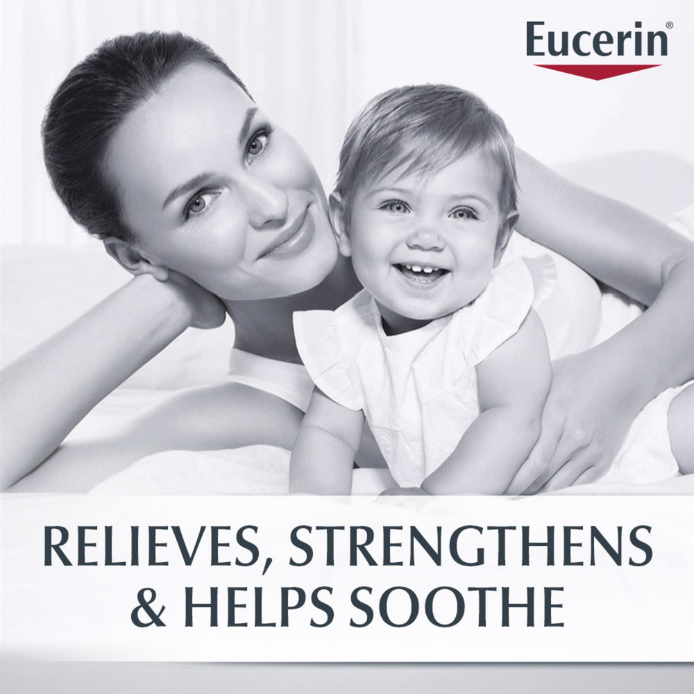 Eucerin 8 oz tube next to ruler displays product size and travel convenience