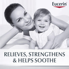 Eucerin 8 oz tube next to ruler displays product size and travel convenience
