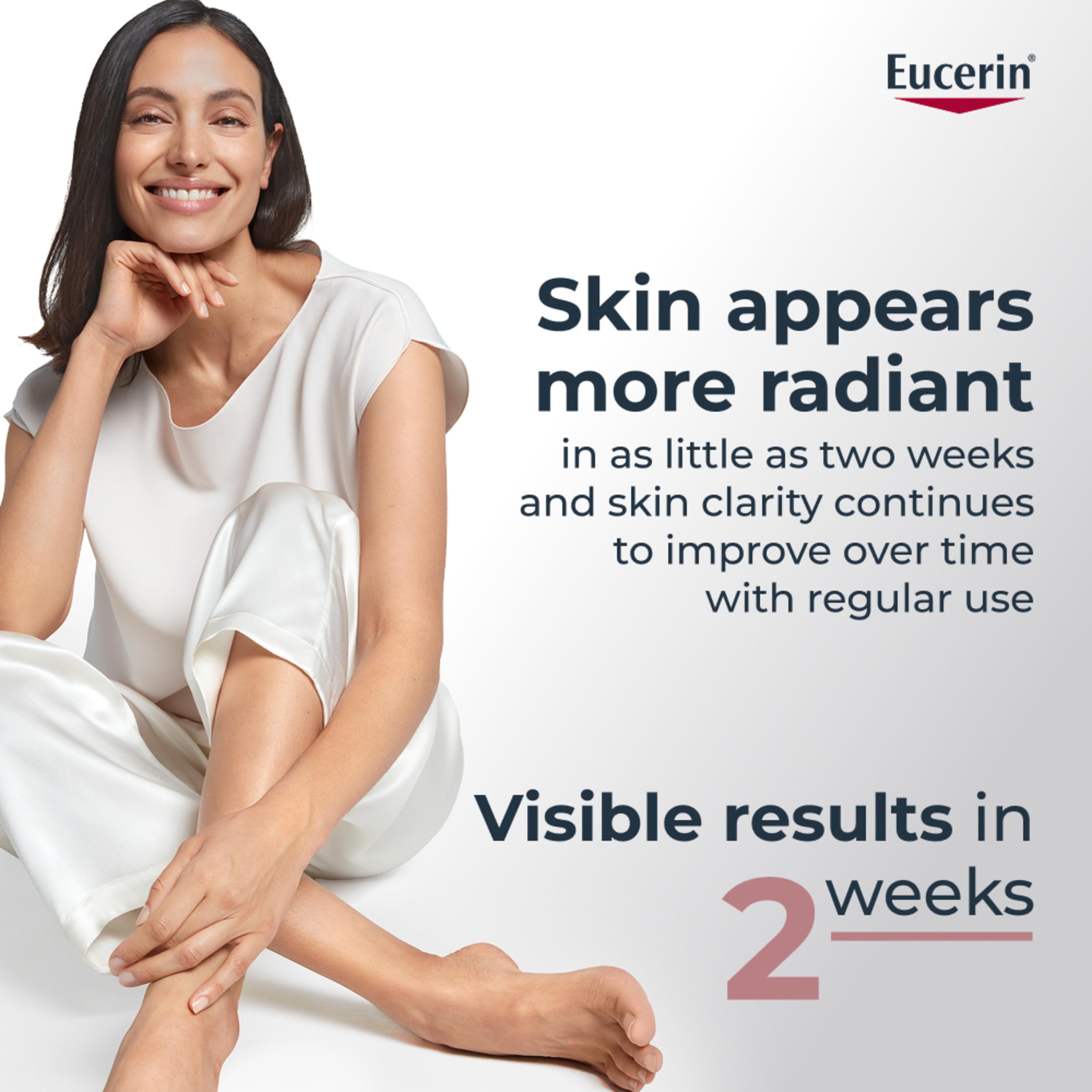 Eucerin tube beside hand for size and scale, useful for travel planning