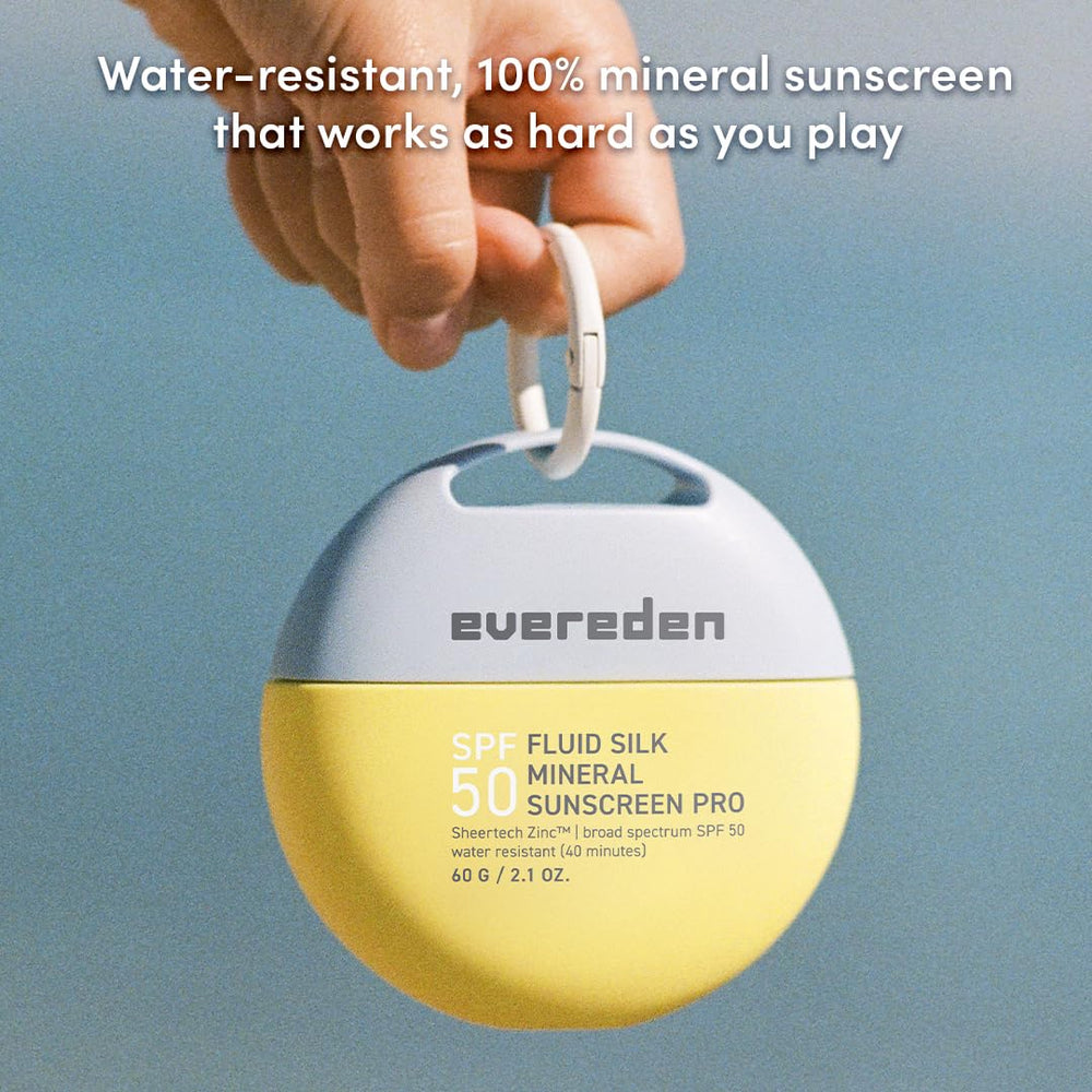 Evereden sunscreen clipped to travel backpack for on-the-go sun protection