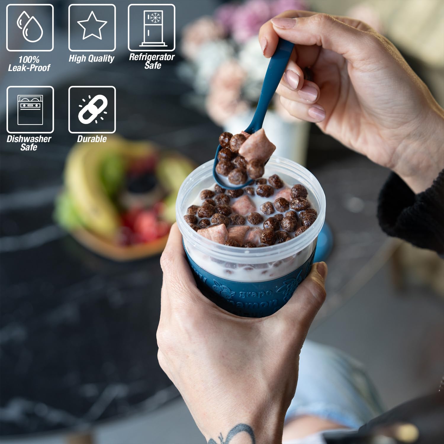 EYNEL lid and spoon detail highlighting leak-resistant divider