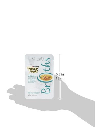 Fancy Feast spoon showing silky broth texture to boost palatability