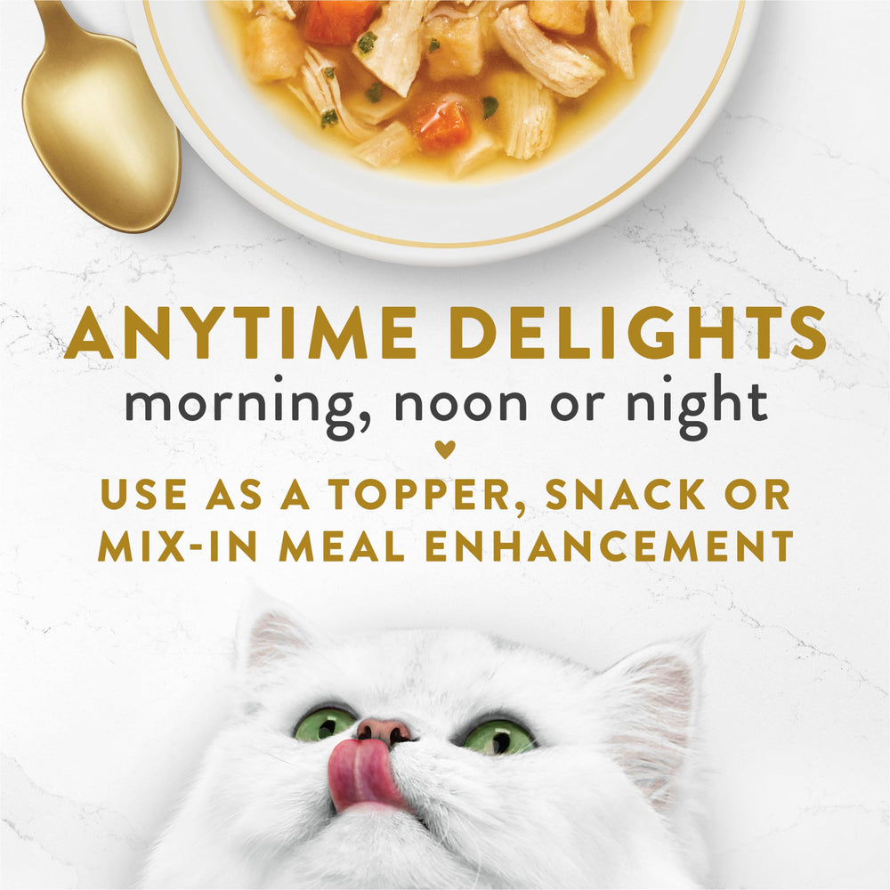 Fancy Feast broth poured into wet food bowl for added flavor and hydration