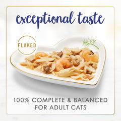 Fancy Feast open can showing flaked fish and shrimp with moisture benefit