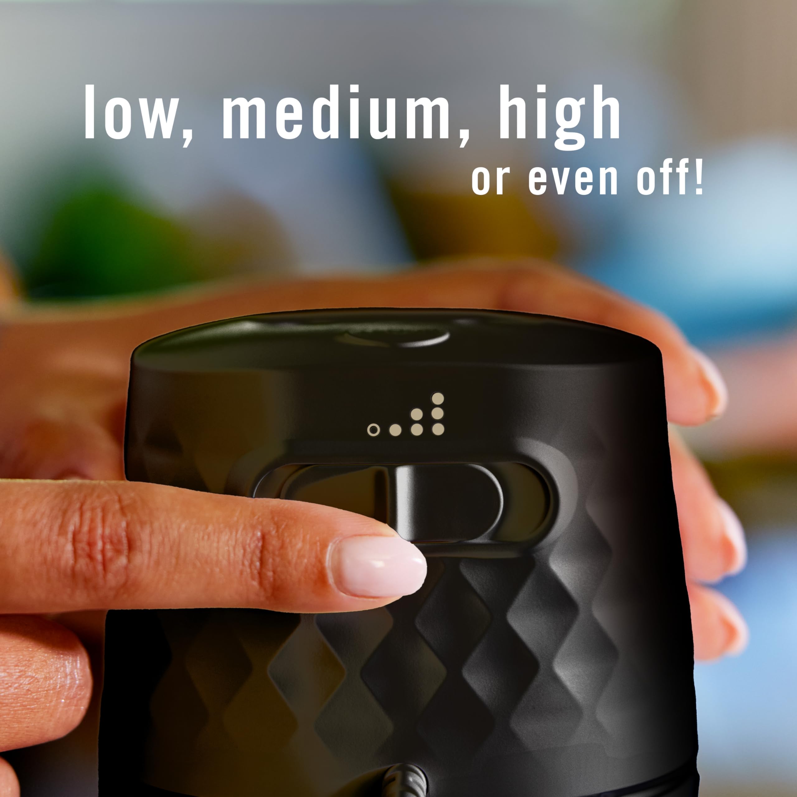 Febreze Plug on a kitchen counter showing how the diffuser masks cooking odors and freshens space