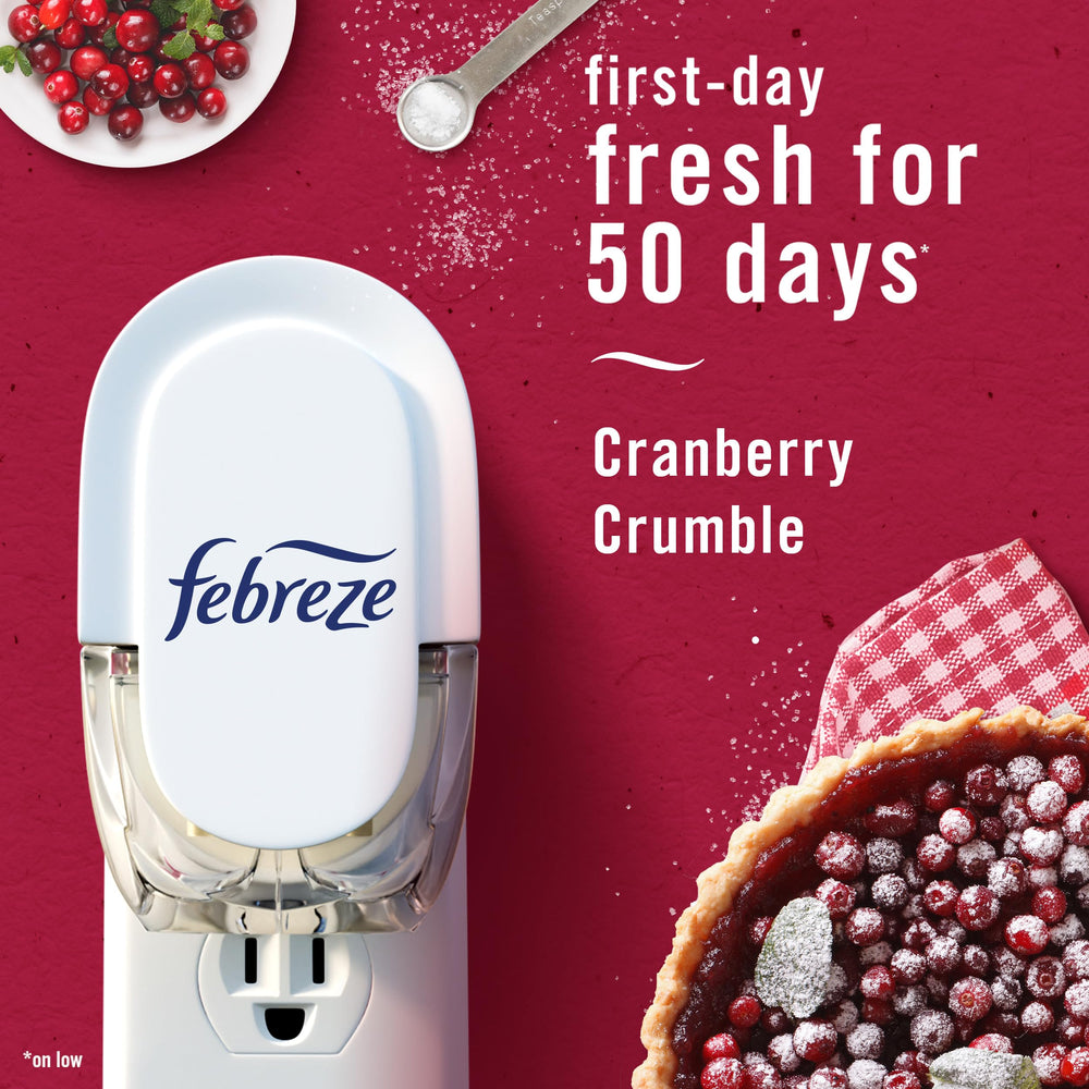 Febreze plug installed in kitchen outlet demonstrating consistent odor control benefit