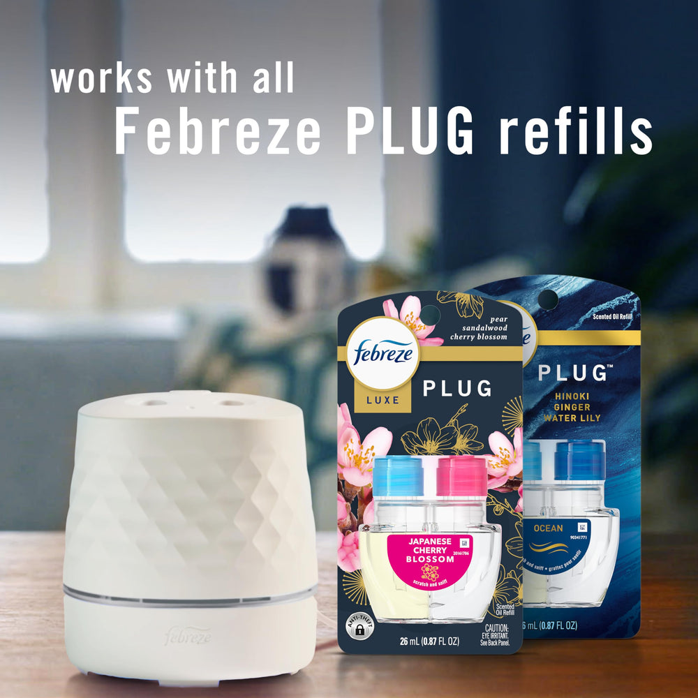 Febreze PLUG in a bathroom setting delivering targeted freshness where needed