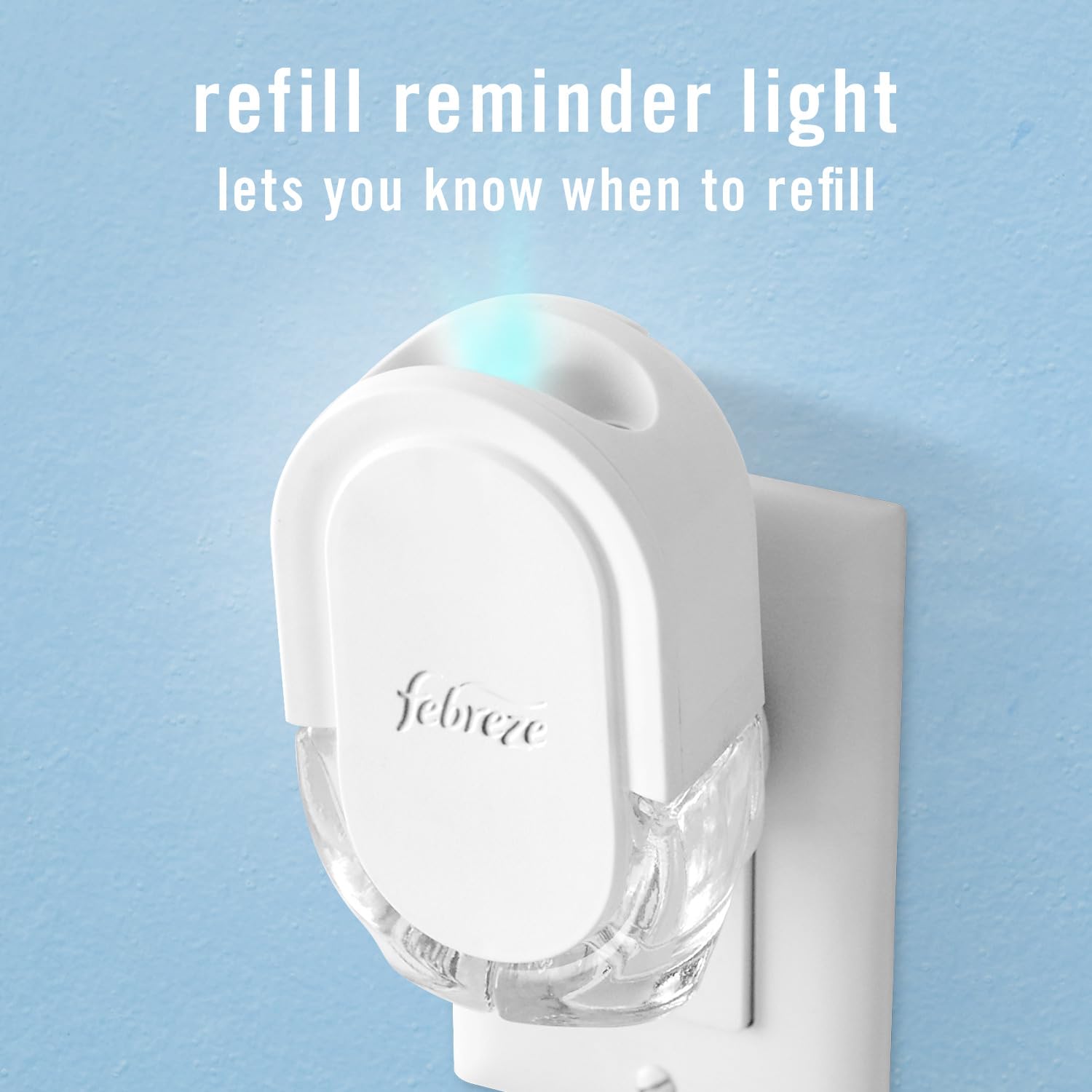 Febreze refills held in hand showing compact size and easy change