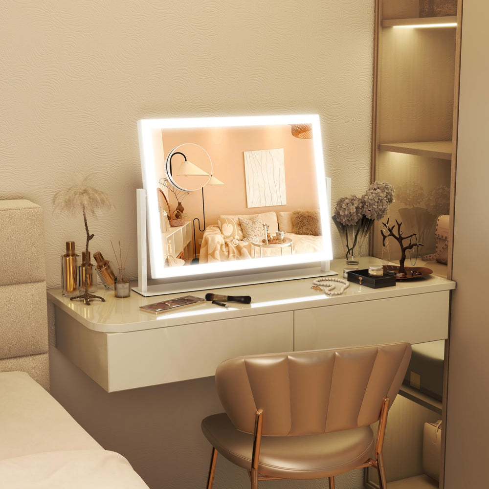 FENNIO mirror beside a hand and cosmetics to show compact 13x17 size scale