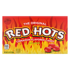 Ferrara Red Hots hand holding a theater box demonstrating portable convenience