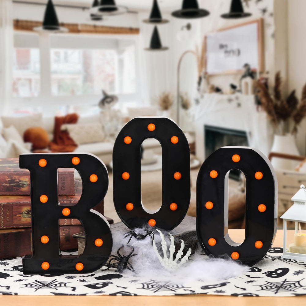 FestalMart BOO on a party table creating playful mood lighting for gatherings