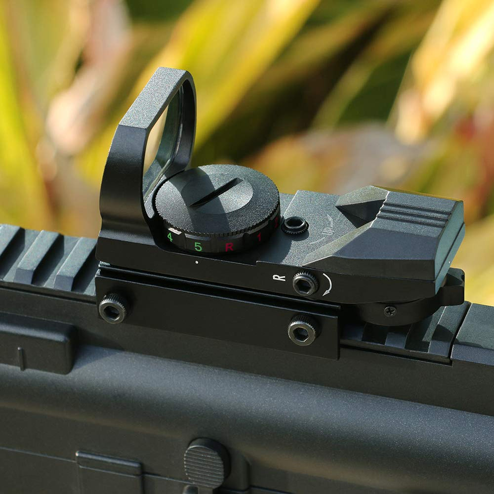 Feyachi sight held in hand for scale showing lightweight, compact design